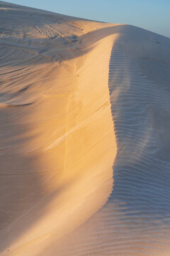 Detailed view of ripples and lines on the side of sand dunes