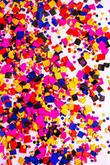 flying gold red colorful confetti isolated on white background