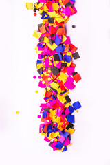 flying gold red colorful confetti isolated on white background