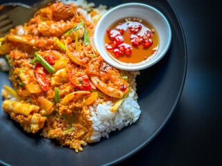 Stir-fried seafood with yellow curry powder with rice