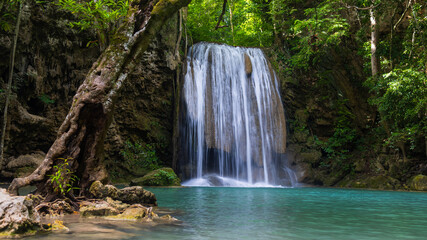 Fototapeta premium Deep forest waterfall in Thailand. Erawan waterfall National Park Kanjanaburi Thailand.