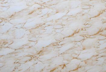 A close-up view of a marble or paper surface featuring intricate veining patterns in shades of white and beige. The texture is smooth and polished.