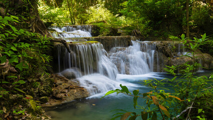 Obraz premium Deep forest waterfall in Thailand. Erawan waterfall National Park Kanjanaburi Thailand.