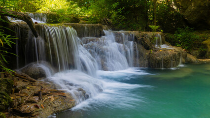Obraz premium Deep forest waterfall in Thailand. Erawan waterfall National Park Kanjanaburi Thailand.