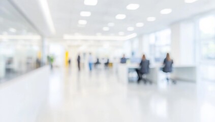 Blurred office interior with people working, featuring a modern white and light blue color scheme with yellow accents. Ideal for a business concept banner, with soft lighting and a clean, contemporary