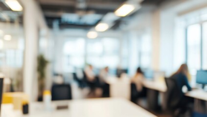 Blurred office interior with people working, featuring a modern white and light blue color scheme with yellow accents. Ideal for a business concept banner, with soft lighting and a clean, contemporary