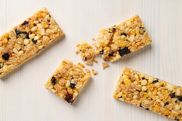 Delicious granola bars on a white background
