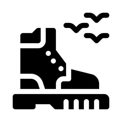 hiking boots glyph icon