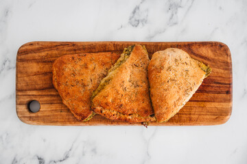 pesto and cheese panzerotti or mini calzoni, Italian food