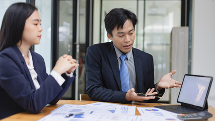 Team of businesswoman working together with analysis report chart in office.