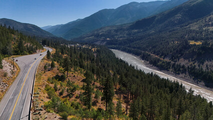 Aerial view of Highway 1 next to Fraser Canyon close to Lytton during a summer season in British Columbia, Canada