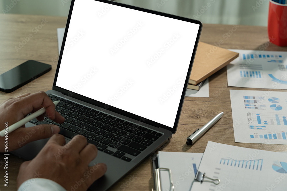 Wall mural young man working businessman using a desktop computer of the blank screen