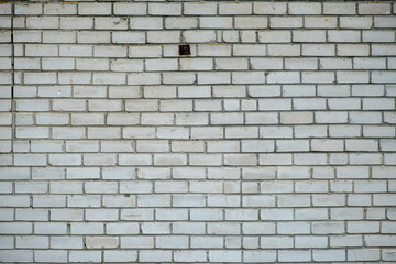 Old aged white brick wall