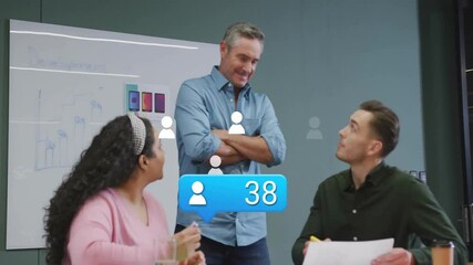 Social media follower count animation over diverse team discussing in office - Powered by Adobe