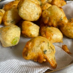 Mysore Bonda on Plate with Tissue Paper Closeup