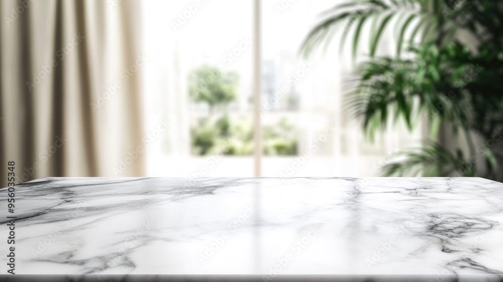 Poster white marble tabletop with a blurred abstract background suitable for product display or montage