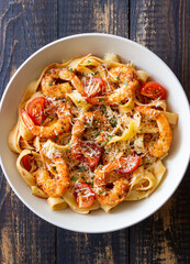 Pasta with shrimps, tomatoes and cheese. Healthy eating. Italian food.
