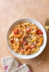 Pasta with shrimps, tomatoes and cheese. Healthy eating. Italian food.