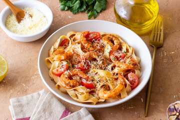 Pasta with shrimps, tomatoes and cheese. Healthy eating. Italian food.