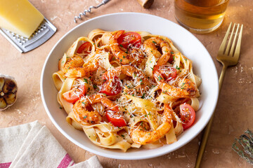 Pasta with shrimps, tomatoes and cheese. Healthy eating. Italian food.