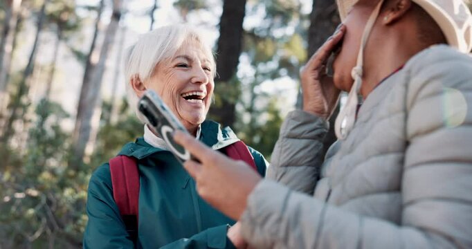 Senior women, friends and phone for hiking, surprise and excited for progress, timer and steps in forest. Mature people, happy and together with smartphone, mobile app and wow for results in Italy