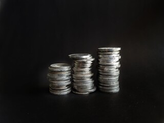 Rupiah banknotes in the form of cents on a black background