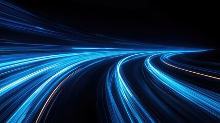 Fast-moving blue light trails on a dark background, illustrating the effect of rapid motion and energy