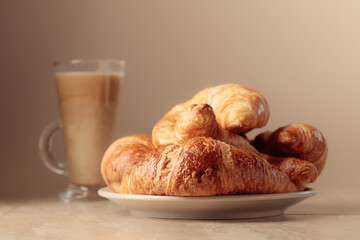 Freshly baked croissants and latte.