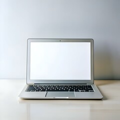 A clean and modern image of a laptop with a blank screen. perfect for showcasing your website. logo. or app design.