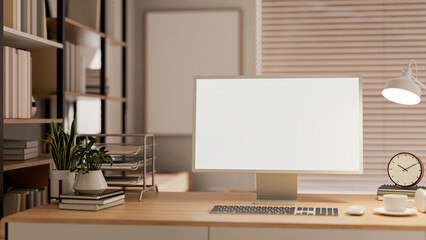 A computer mockup on a wooden desk by a bookshelf in a contemporary Scandinavian office room.