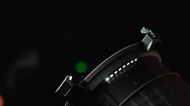 Studio light.
A bright spotlight is turned on and shines on the set.
Filming location.
Lighting equipment.
Film industry, photo studio, spotlight.
4K video in close-up