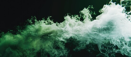 Obraz premium Copy space image featuring green and white steam against a black backdrop
