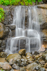 Obraz premium Tamhini waterfall, Beautiful nature scenery, Mountain waterfall in the forest, amazing Nature, Pune, Maharashtra, India.
