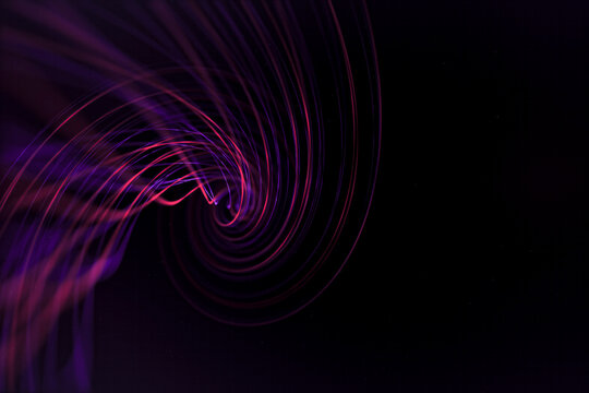 Purple and red swirling patterns against black background