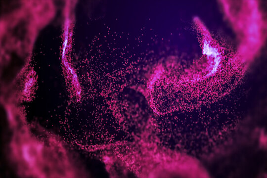 Pink particles spreading against dark background