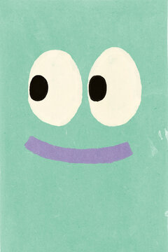 Funny cartoon face smiling and looking up on green background