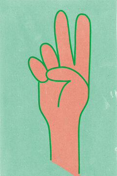 Hand with three fingers raised on green background