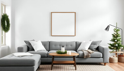 A living room with a gray sofa, white throw pillows, and a white blank framed  on the wall, christmas