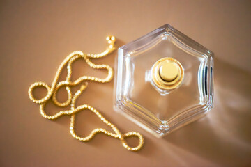 Golden Necklace and Perfume Background