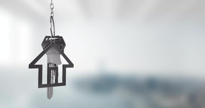House-shaped keychain with keys animation over blurred background