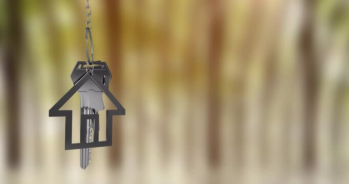 House-shaped keychain animation over blurred background