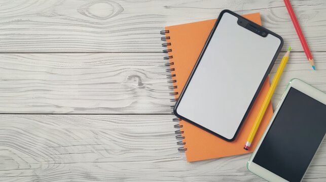 top view of school supplies notepads pencils and smartphone on light wooden surface