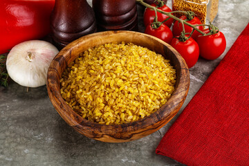 Dry wheat bulgur cereal heap