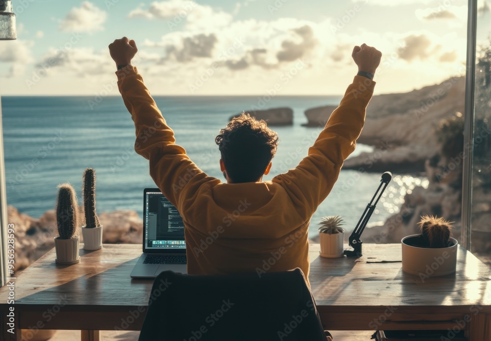 Poster a man celebrates his achievement while working in a hotel, with a view of the sea and rocks in the b