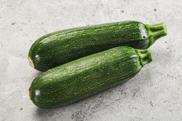 Raw green ripe zucchini vegetable