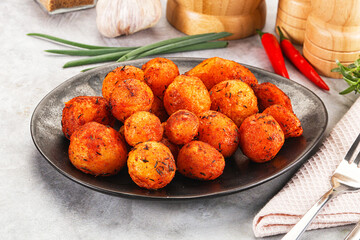 Baked young potato with paprika