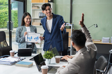 Business, technology and office concept, businessman with laptop, tablet pc computer and papers having discussion in modern office.