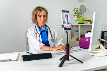 Female doctor working on online consultation in hospital