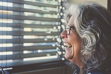 Fototapeta premium A woman with glasses is smiling and looking out the window