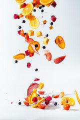 High speed photography of fruits and vegetables thrown into the air, Fruit Ninja, white background